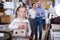 girl with curbstone in furniture store