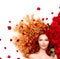 Girl with curly red hair and beautiful red roses