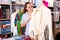 Girl customer deciding on the choice of bathrobe