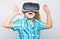 Girl cute child with head mounted display on white background. Virtual reality concept. Small kid use modern technology