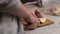 Girl cuts apple into small pieces