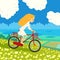 Girl cycling on the meadow