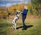 Girl dancing with a Dalmatian