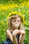 Girl with dandelion chain