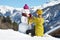 Girl decorating a snowman