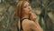 girl in dense forest old dry video branches outdoors slow motion