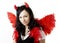 Girl in a devil costume with a gift