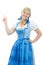 Girl in dirndl points her finger upwards