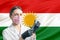 Girl doctor prepares vaccination against the background of the Kurdistan flag. Vaccination concept Kurdistan