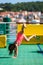 Girl doing cartwheels on Croatian ferryboat in Mali Losinj