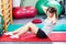 Girl doing crunches on gym mat