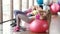 Girl doing exercise on fit ball in a gym