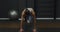 Girl doing exercises in the gym in a blue suit. Losing weight after a pandemic.