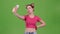 Girl doing selfie. Green screen. Slow motion