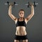 Girl doing shoulder workout with dumbbells