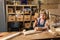 Girl doing woodwork in a workshop