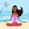 Girl doing yoga lotus position on the beach
