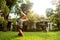 Girl doing yoga in a tropical garden