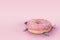 Girl with  donut. Fast food concept, overweight. Minimal pink background