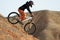 Girl downhill on bike