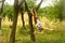 A girl dreaming under tree in rural place