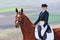 Girl and dressage horse