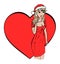 Girl dressed as Santa Claus - big red heart