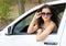 Girl driver portrait with sunglasses inside car