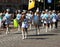 Girl drummers marching down the street