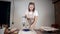 Girl drying her clay products.