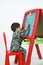 Girl on easel