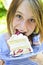 Girl eating a cake