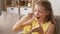 Girl eating cake at home