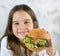 Girl eating hamburger