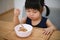 Girl eating natto rice