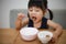 Girl eating natto rice