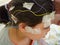 Girl with EEG electrodes attached to her head for medical test