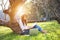 Girl enjoy reading a book under the tree