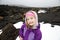 Girl enjoying herself on lava fields of Mount Etna