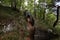 A girl explores the 18th century forts on the Mezzolago tumulus, on the shores of Lake Molveno.