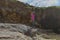 Girl explores the shoreline a Cape Kiwanda on Oregon Coast