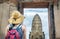 Girl exploring ancient Ayutthaya city in Thailand