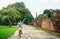 Girl exploring Ayutthaya on bicycle