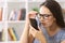 Girl with eyesight problems trying to read phone text