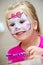 Girl with face painted