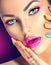 Girl face with vivid makeup and colorful nail polish