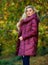 Girl fashionable blonde walk in autumn park. Jackets everyone should have. Best puffer coat to buy. How pick puffer