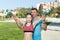 Girl with father exercising with dumbbells