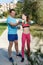 Girl with father exercising with dumbbells