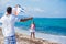 Girl and father with kite